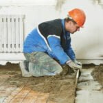 Edilizia, realizzazione massetto in cantiere
